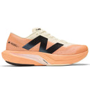 TENIS NEW BALANCE FUELCELL REBEL V4 LARANJA